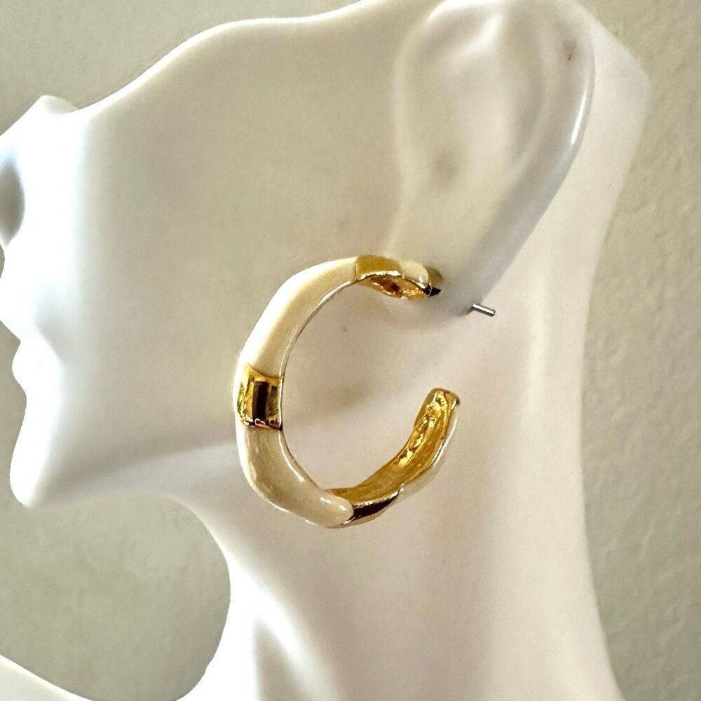 Cream and gold tone hoop earrings